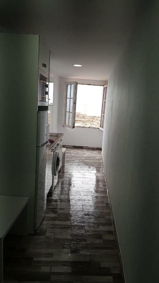 Apartamento Muelle Pozo Izquierdo Extérieur photo